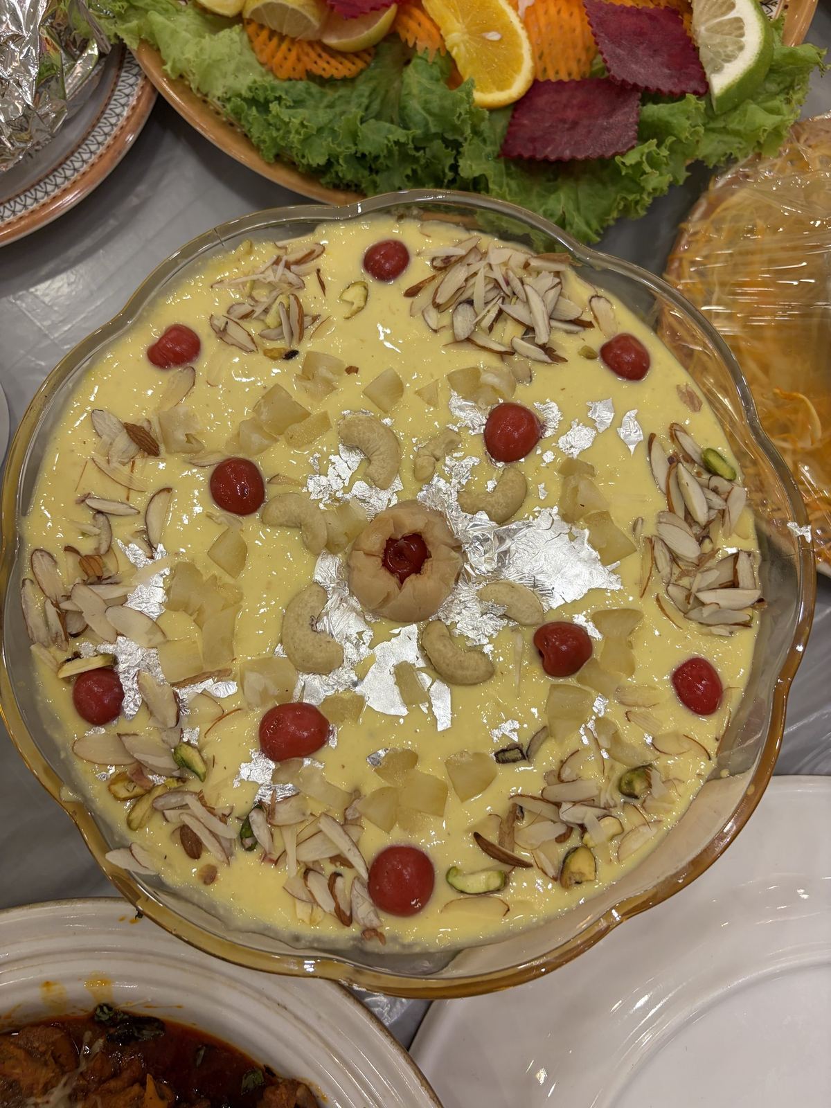 Badam ka kunda with almonds, pistachio and silver varq by Riwayat Caterers